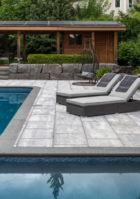 Sleek Unilock Paver Pool Deck with Pool Coping