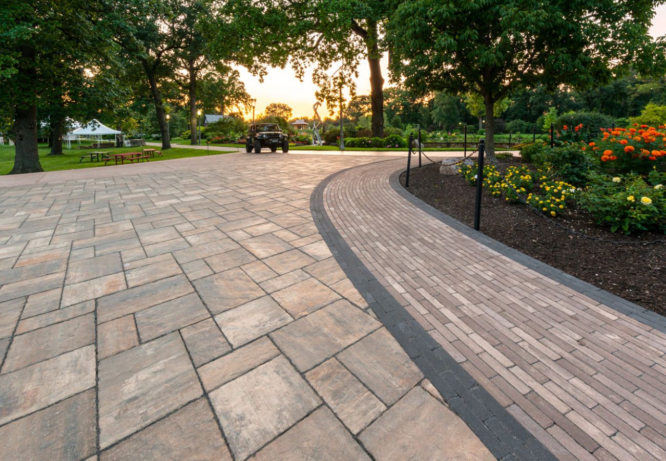 Outdoor Patio with a Divding Unilock Curved Walkway with Boarders