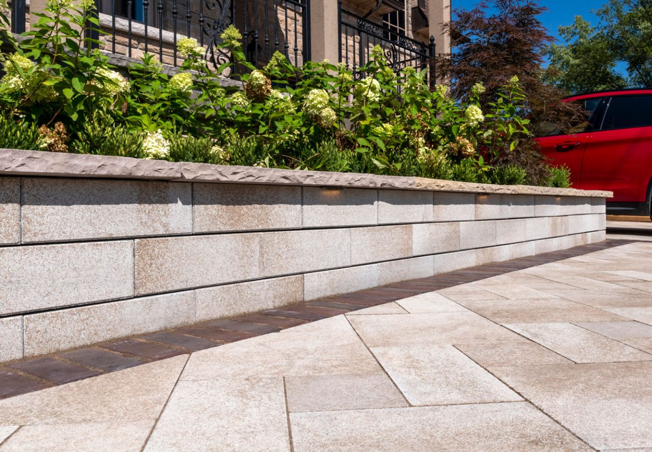 Unilock Umbriano Driveway with Town Hall Boarders and U-Cara Retaining Wall