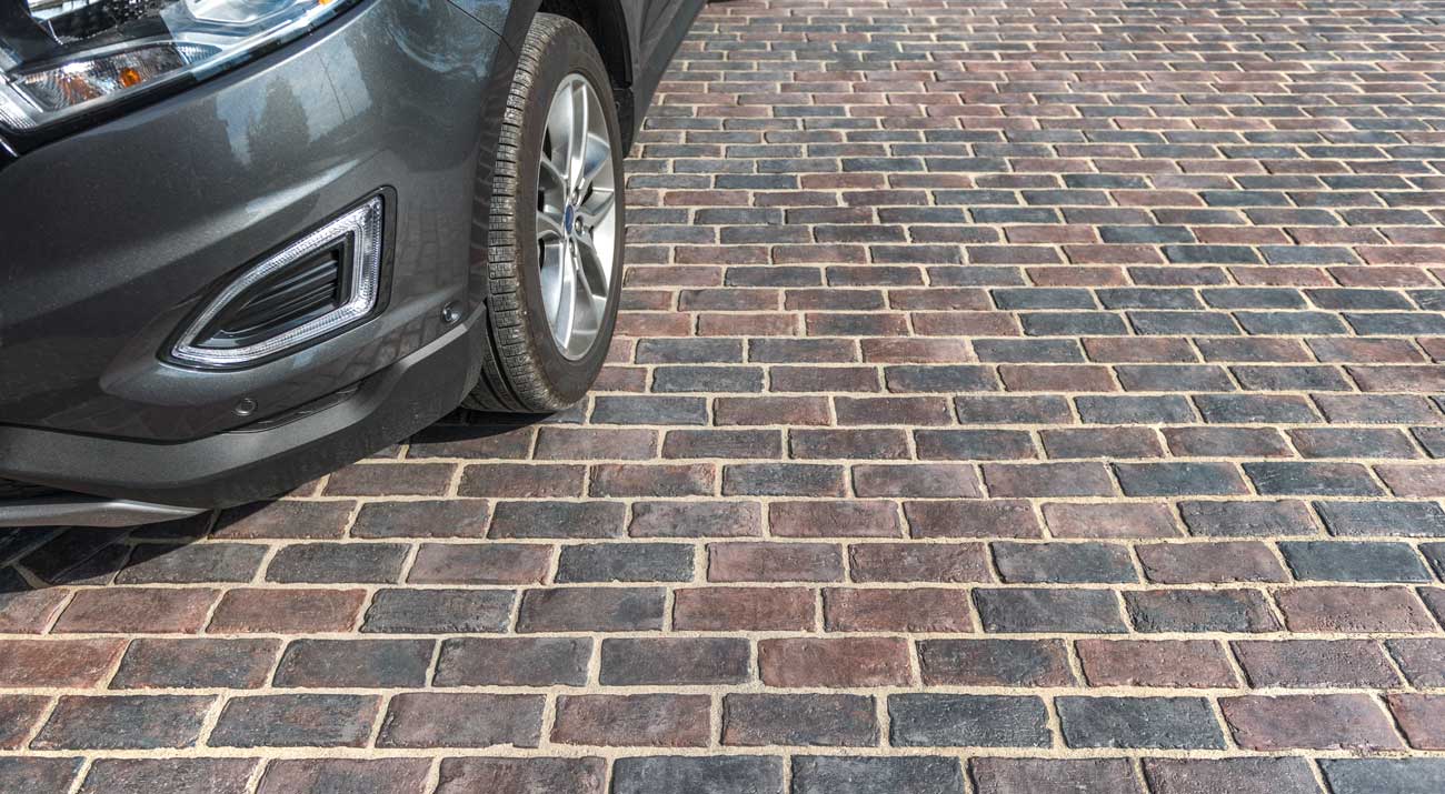 Heritage-inspired driveway with Unilock Town Hall Elegance pavers