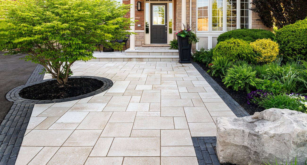 Biophilic design inspired walkway with tree and nearby garden bed